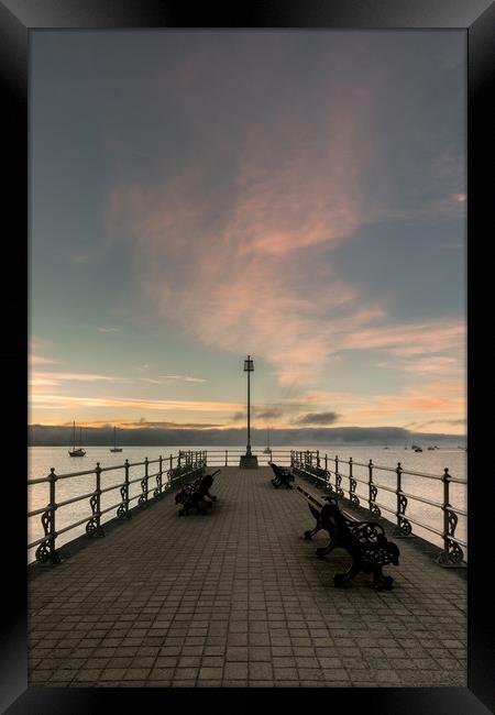 Sunrise at Banjo Pier in Swanage Framed Print by Owen Vachell