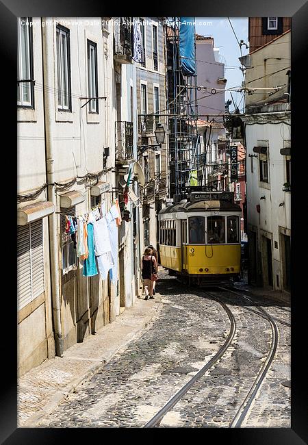 Lisbon's Iconic Tram No.28 Journey Framed Print by Steven Dale