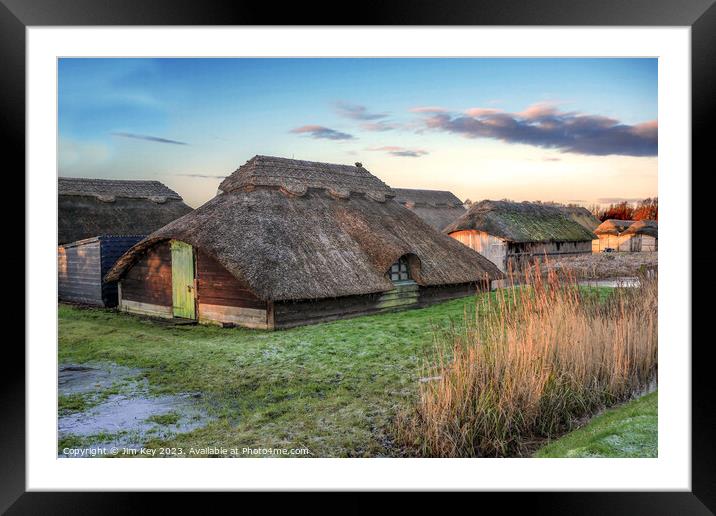 Thatched boat houses Hickling Broad Framed Mounted Print by Jim Key