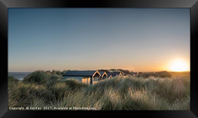 Brancaster Beach Huts Sunrise Norfolk Framed Print by Jim Key