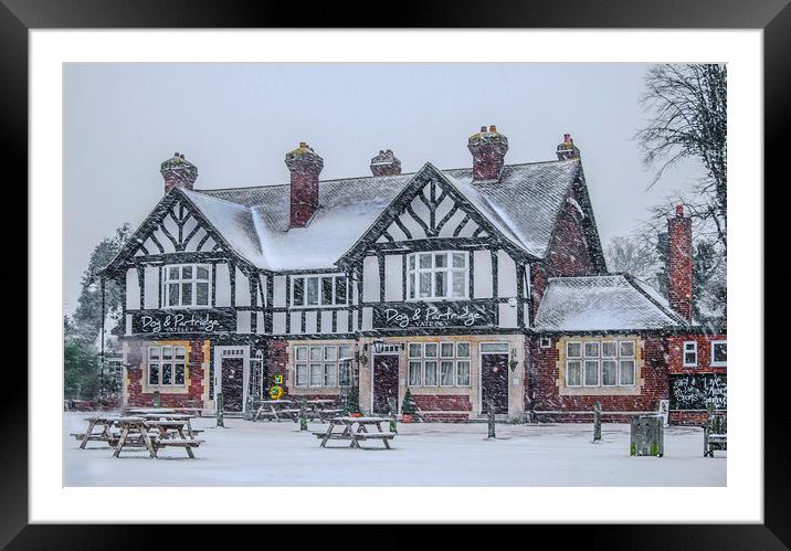 The Dog & Partridge Pub in the Snow Framed Mounted Print by Dave Williams
