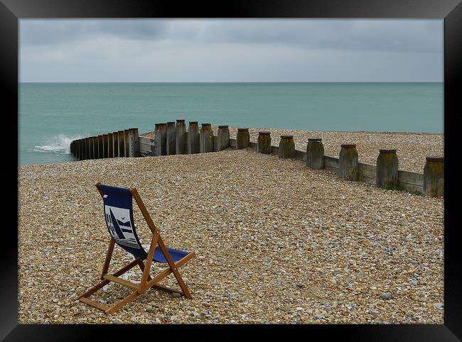 The Lone Deck Chair Framed Print by Dave Williams