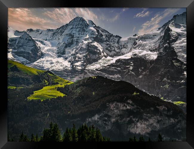 The Monch snow capped Mountain in Switzerland Framed Print by Dave Williams