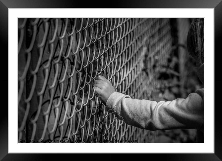 Little girl hand holding fence Framed Mounted Print by Daniela Simona Temneanu