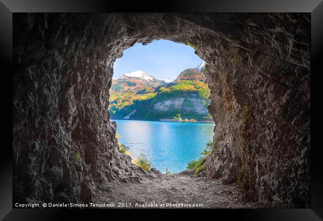 Mountain cave with a colorful view Framed Print by Daniela Simona Temneanu