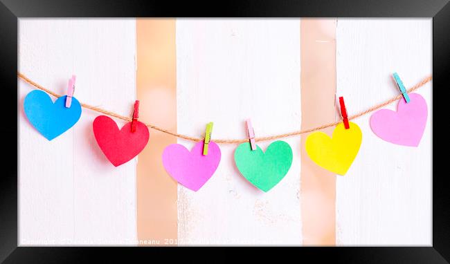 Multicolored hearts tied on a string Framed Print by Daniela Simona Temneanu