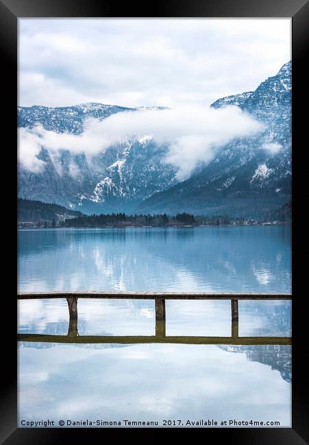 Alps mountains reflected in water Framed Print by Daniela Simona Temneanu