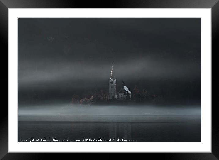 Church on Bled Island in fog Framed Mounted Print by Daniela Simona Temneanu