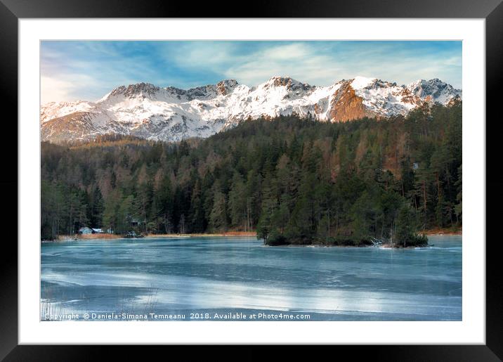 Frozen lake and snow-capped mountains Framed Mounted Print by Daniela Simona Temneanu