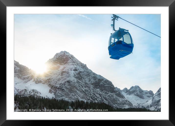 Cable car and snow-capped mountains Framed Mounted Print by Daniela Simona Temneanu