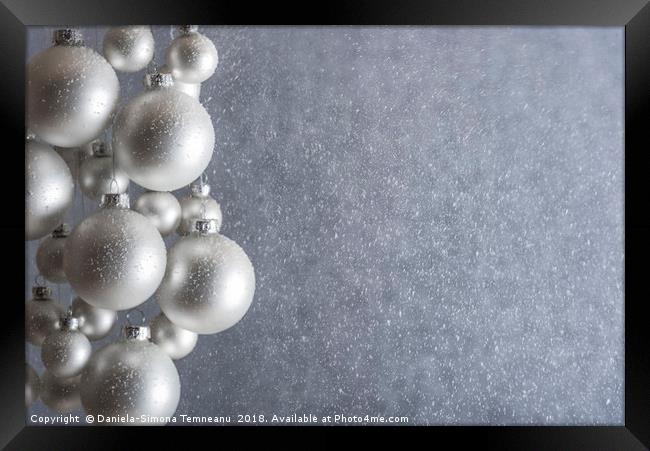 Light silver Christmas balls and snowstorm Framed Print by Daniela Simona Temneanu