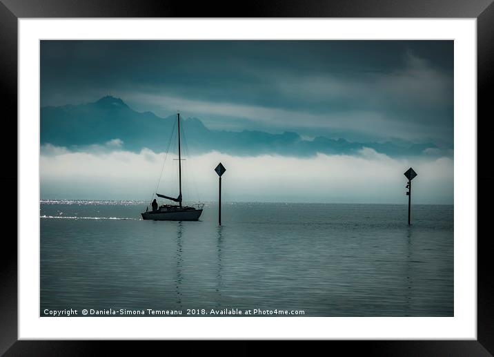 Boat sailing silhouette Framed Mounted Print by Daniela Simona Temneanu