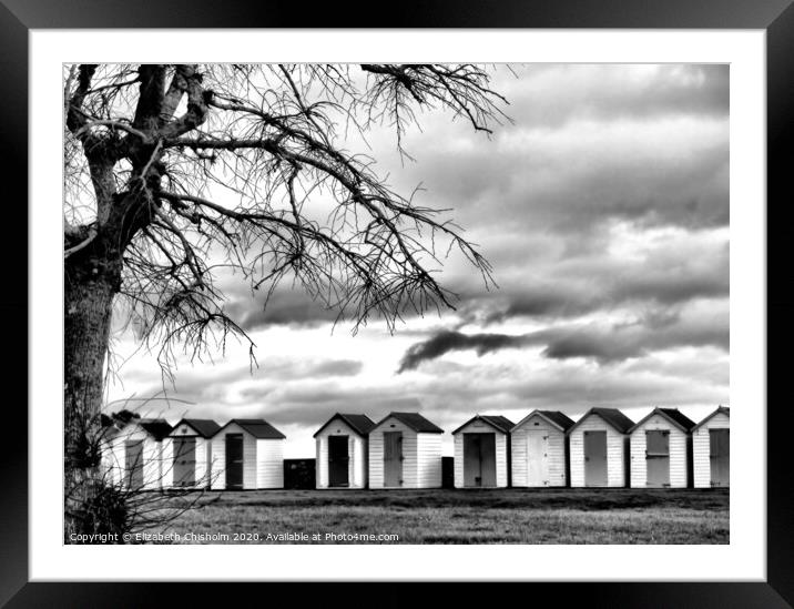 Beach Huts in Black and White -End of the season Framed Mounted Print by Elizabeth Chisholm
