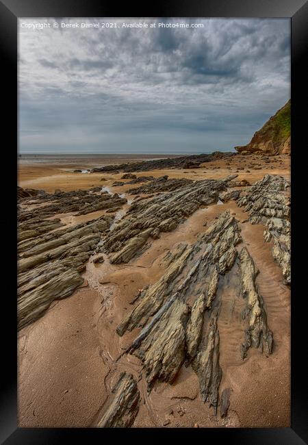 Majestic Rocks of Saunton Sands Framed Print by Derek Daniel