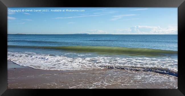 Sunlit Wave Framed Print by Derek Daniel