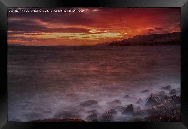 Stunning Sunset over the Jurassic Seascape Framed Print by Derek Daniel