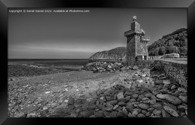 Majestic Lynmouth Tower Framed Print by Derek Daniel