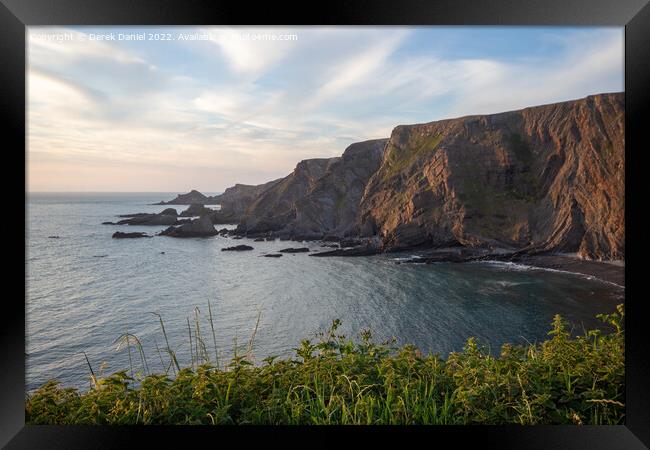 Majestic sunset at Hartland Quay Framed Print by Derek Daniel