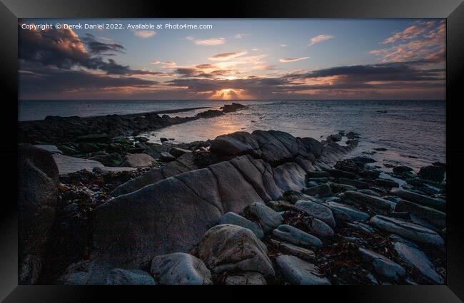 Moody Sunrise over Jurassic Coast Framed Print by Derek Daniel