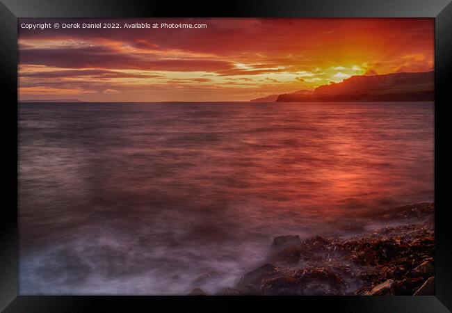 Majestic Sunset over Jurassic Seascape Framed Print by Derek Daniel