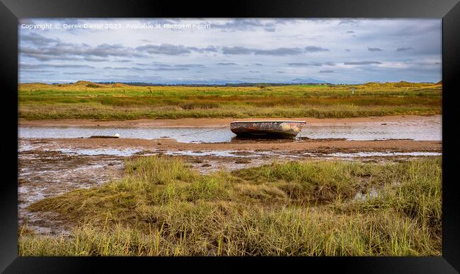 The Haunting Abandoned Boat of Aberffraw Framed Print by Derek Daniel