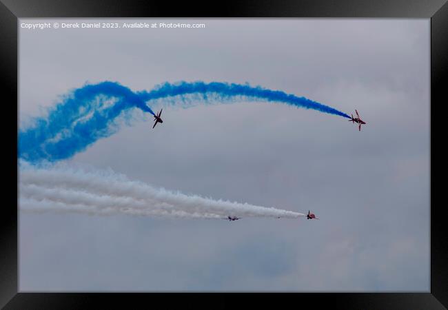 Thrilling Aerobatic Display by Red Arrows Framed Print by Derek Daniel