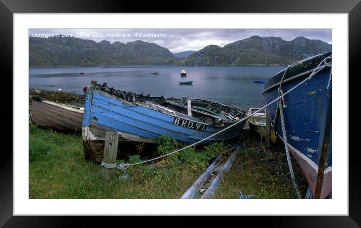 Moored boats by a Scottish Loch Framed Mounted Print by Derek Daniel