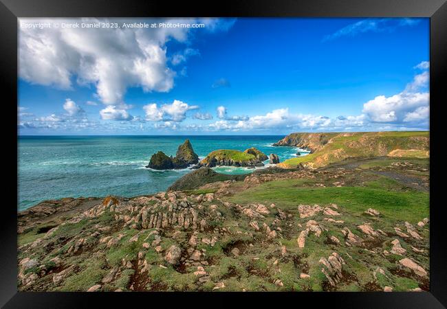 A walk along the clifftop at Kynance Cove, Cornwall Framed Print by Derek Daniel