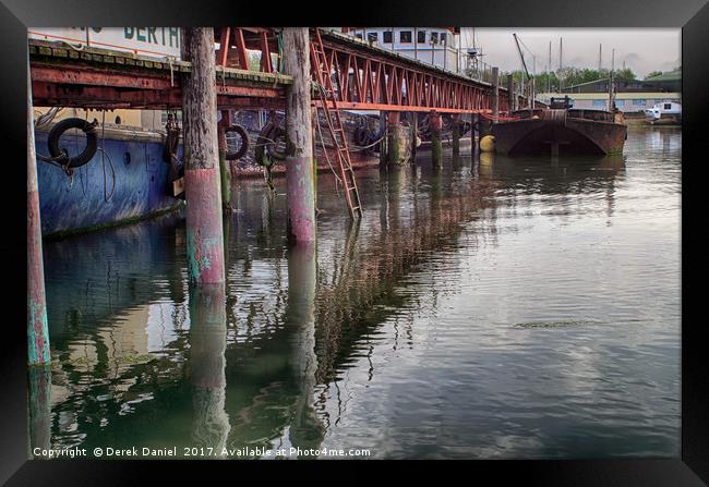 Rusty Reflections on Southampton Boat Berth Framed Print by Derek Daniel