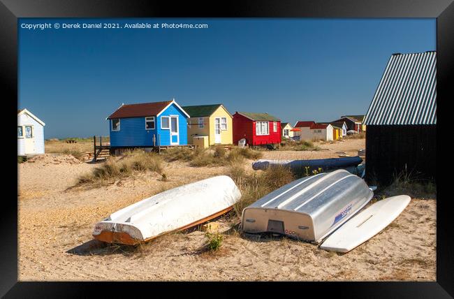 Vibrant Beach Huts Framed Print by Derek Daniel