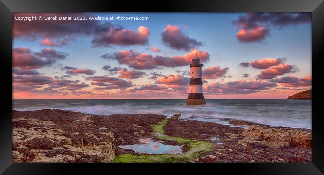 Radiant Welsh Sunset at Trwyn Du Lighthouse Framed Print by Derek Daniel