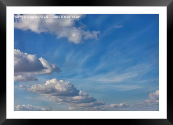 A blue sky background with a texture of white fluffy clouds Framed Mounted Print by Sergii Petruk