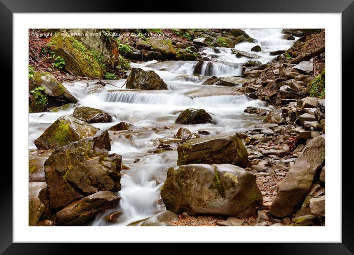 A swift whitish stream of a mountain river among stone boulders. Framed Mounted Print by Sergii Petruk