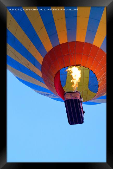 Fragment of a balloon with a basket and a flame of fire from a burner heating the air. Framed Print by Sergii Petruk
