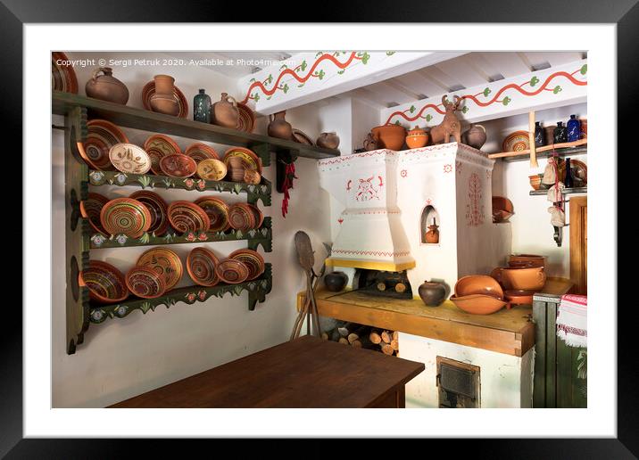 Design of an old oven and kitchen ware in an old Ukrainian farmhouse. Framed Mounted Print by Sergii Petruk