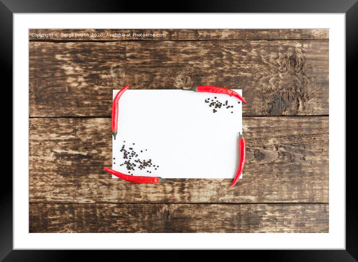 hot red peppers chili on an old wooden background Framed Mounted Print by Sergii Petruk