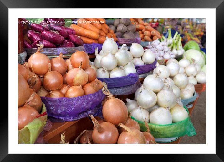 different varieties of onions are sold in trays on the market Framed Mounted Print by Sergii Petruk