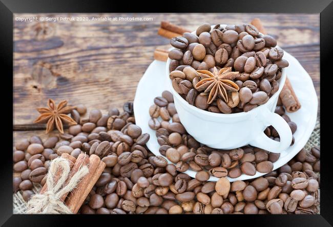 Grain coffee in a cup. Cinnamon on a platter and tied with string. Anise stars complement the aroma of coffee. Framed Print by Sergii Petruk