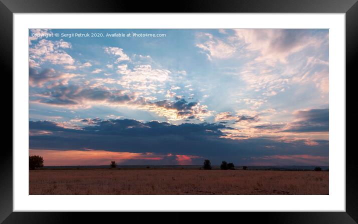 A great storm cloud closed the setting sun Framed Mounted Print by Sergii Petruk