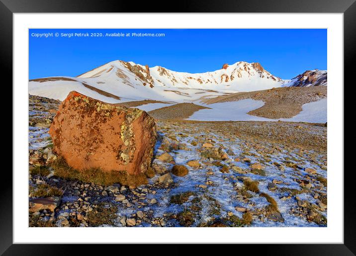 A large boulder in defocus on the way to the top of Mount Erciyes in central Anatolia, Turkey. Framed Mounted Print by Sergii Petruk