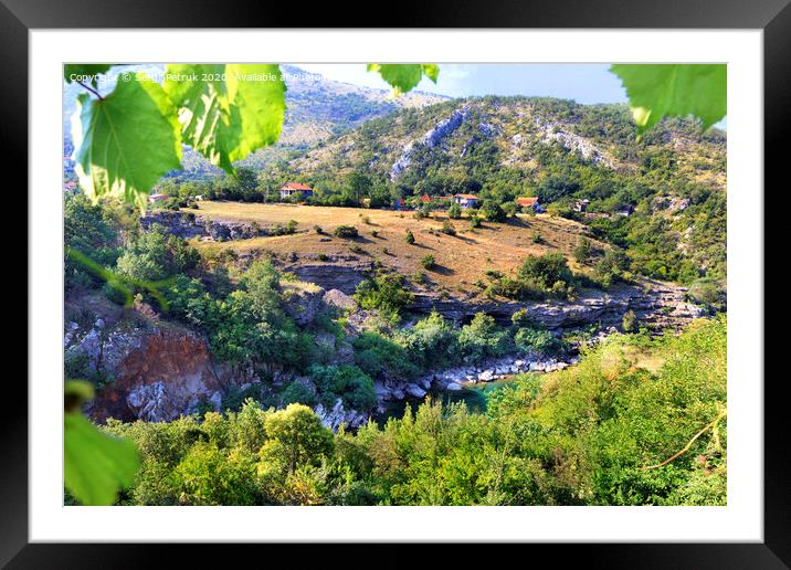 View of the mountain river overcoming rocky shores and stone rapids among the countryside in the mountains of Montenegro. Framed Mounted Print by Sergii Petruk