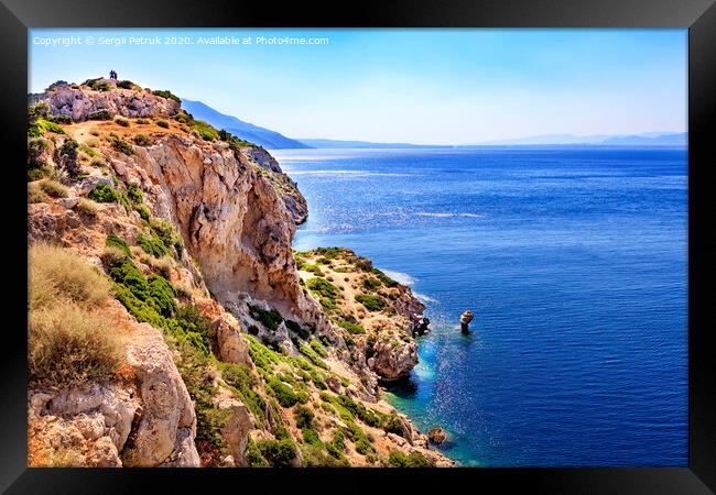 Seascape from the rocky steep coast of the Ionian Sea in Greece. Framed Print by Sergii Petruk