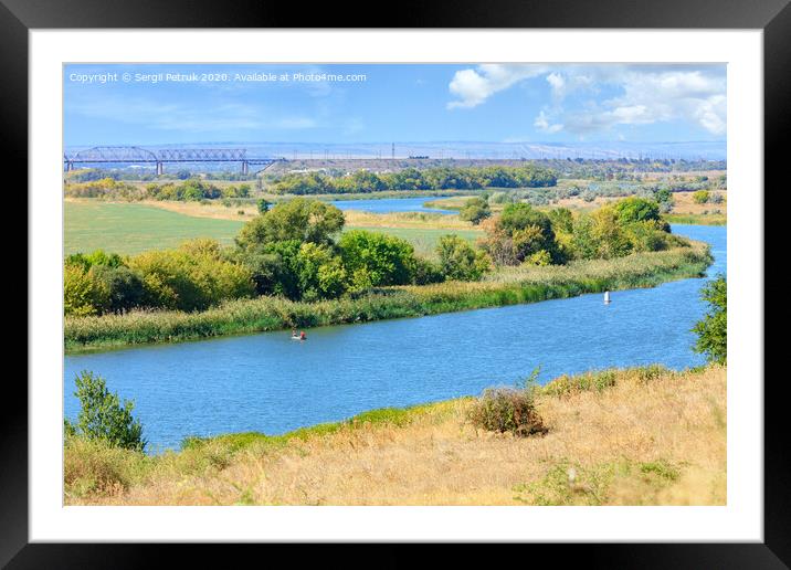 View of the Southern Bug River and the railway bridge on the horizon. Framed Mounted Print by Sergii Petruk