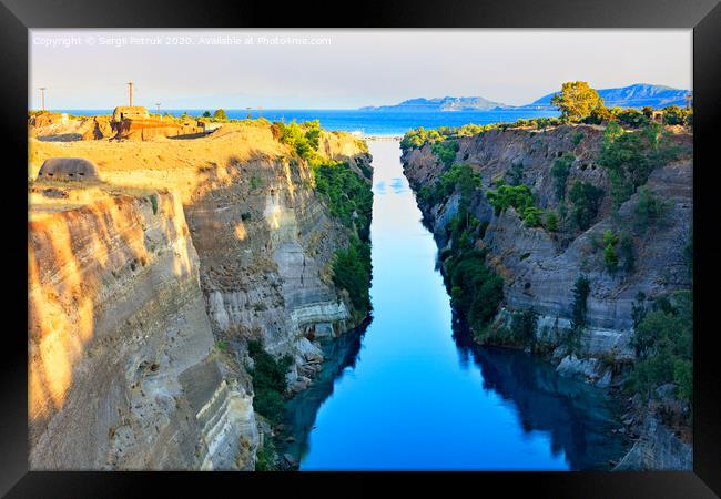 Aerial view of the Corinth Canal in Greece, the shortest European canal 6.3 km long, connecting the Aegean and Ionian Seas. Framed Print by Sergii Petruk