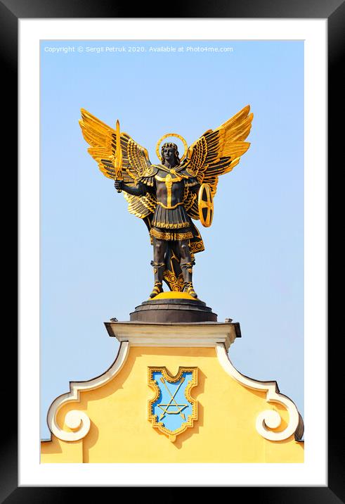 Monument to St. Michael on the Maidan in Kyiv against the blue sky. Framed Mounted Print by Sergii Petruk