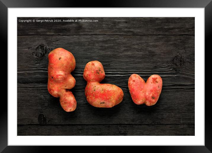 Ugly vegetables on a black wooden background. Vegetables or food waste concept. Top view, close-up. Framed Mounted Print by Sergii Petruk