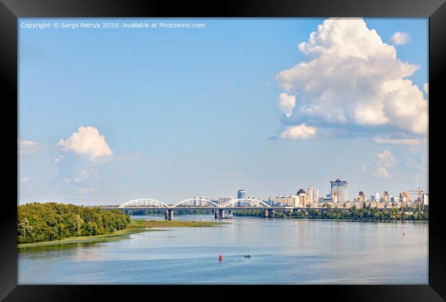 A large figured cloud hung over the city near the railway bridge near the Dnipro River. Framed Print by Sergii Petruk