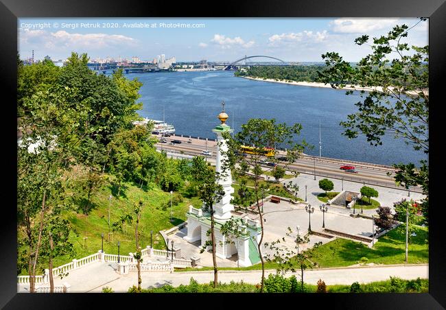 Beautiful landscape of summer Kyiv with a view of the Dnipro River and a monument to the Magdeburg Law. Framed Print by Sergii Petruk