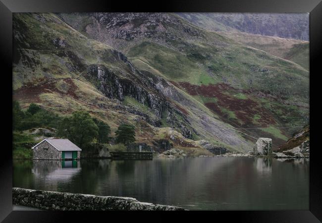 The house across the lake Framed Print by Kieran Bellis