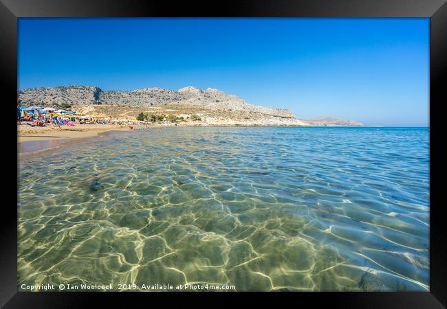 Agathi Beach on the Island of Rhodes Greece Framed Print by Ian Woolcock